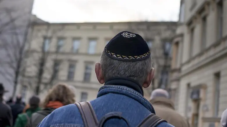 Kippah-clad man during Holocaust remembrance march